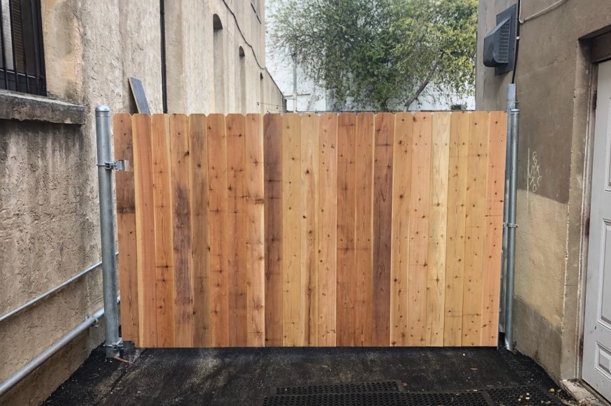 Wood gate with metal framework by D&C Fence Co in Corpus Christi, Tx, TX